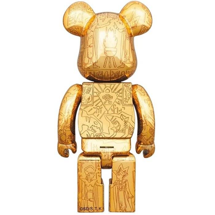 400% Bearbrick figure with golden Yu-Gi-Oh! Millennium Puzzle design and light-up feature