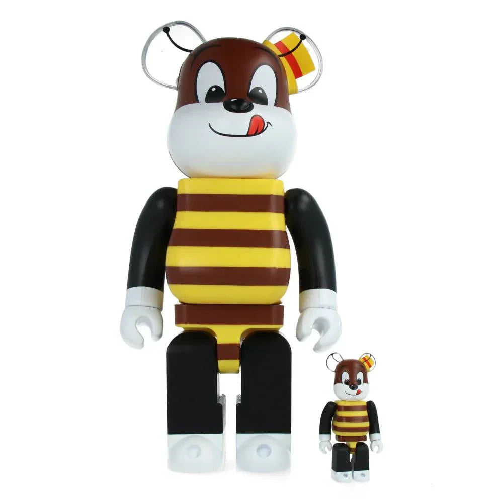 Bearbrick set featuring 400% and 100% figures with Kellogg's honey-themed design.