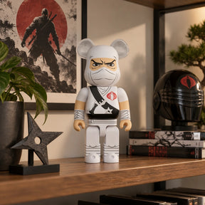 400% Bearbrick - Storm Shadow (G.I. JOE) | This statue, on a shelf displayed or in a living room.